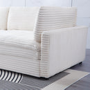 The 112-inch beige corduroy sofa, with two throw pillows and four backrests, has opened up a new style for the living room's leisure area