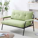 The 53-inch green sofa offers a spacious layout in the small apartment, easily handling various scenarios from watching movies to working