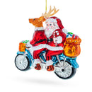 Santa and Reindeer Riding a Tandem Bike Glass Christmas Ornament