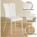 Modern minimalist dining chairs, white PU back and seat cushion, white metal legs, suitable for dining room,living room.Cream-Style dining chairs with a vertical line design on backrest.Six Pieces.