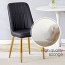 Table and chair set.Luxurious Snow Mountain White Slab Round Dining Table Set - 47'x47' with 4 Black PU Chairs with Simple Line Designs On The Backrest .Golden Metal Legs.