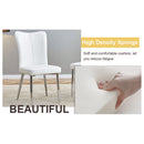 Table and chair set.63'x31.5x30' Luxurious Pandora patterned Sintered Stone Tabletop with Silver Stainless Steel Legs.Paried With 4 White PU Chairs with a vertical stripe design on the backrest.