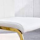 Table and chair set.Large modern rectangular table with 0.4 inch patterned glass tabletop and large MDF table legs.Comes with 8 chairs with faux leather cushioned seats and golden metal legs.