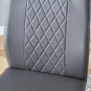 Table and chair set.63'x31.5x30' Luxurious Pandora patterned Sintered Stone Tabletop with Silver Stainless Steel Butterfly Legs.Paried With 6 Dark Gray High-quality PU Chairs With Arched Metal Legs.
