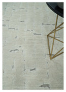 8x10 carved pattern Beige and Gray hand knotted wool rug