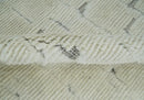 8x10 carved pattern Beige and Gray hand knotted wool rug