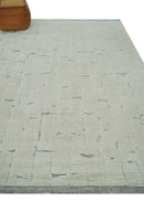 8x10 carved pattern Beige and Gray hand knotted wool rug
