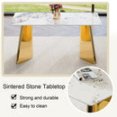 Table and chair set.63'x31.5x30' Luxurious Pandora patterned Sintered Stone Tabletop with Golden Stainless Steel Butterfly Legs.Paried With 4 Black High-quality PU Chairs With Arched Metal Legs.