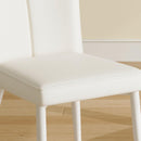 Modern minimalist dining chairs, white PU back and seat cushion, white metal legs, suitable for dining room,living room.Cream-Style dining chairs with a vertical line design on backrest.Six Pieces.