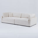 The 112-inch beige corduroy sofa, with two throw pillows and four backrests, has opened up a new style for the living room's leisure area
