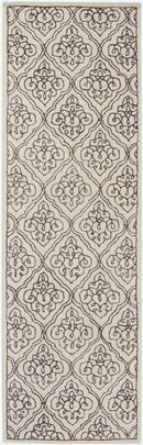 Woezik Traditional Ivory Area Rug