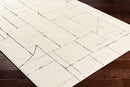 Sheritta Modern Ivory/Black Area Rug
