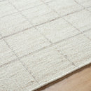 Ishaq Solid and Border Ivory Area Rug