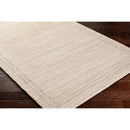 Janmichael Solid and Border Tan Area Rug