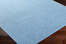 Tobey Solid and Border Pale Blue Washable Area Rug