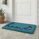 A Bird Perched on Home Coir Doormat