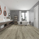 WPC Vinyl Rigid Core 9" Width 60" RL 8.5mm Thick, 1.5mm IXPE Akaroa Ash Romulus Floors - Mazzia Collection bathroom view