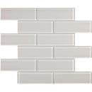 Aquatica 2x6 brick mist mosaic glass tile on 11.75x11.75 element series ANAELEMMIS26 top view