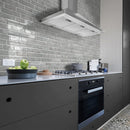 Aquatica ghiaccio 6.5x15.25 interlocking brick porcelain tile loose dany series KRADANYGHIA616 installed kitchen dark gray cabinets modern appliances