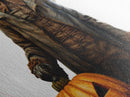 Spooky child scarecrow with glowing eyes Canvas Embossed Print holding jack-o-lantern in creepy Victorian Diamond Shaped Art