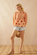 Copriandra Peplum Top