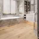 SPC Vinyl Rigid Core 9" Width 60" RL, 7mm Thick, 5.5mm IXPE Bungalow Tan Zephyr Floors - Mazzia Collection Product shoot washroom view 2