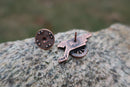 Cannon Copper Lapel Pin