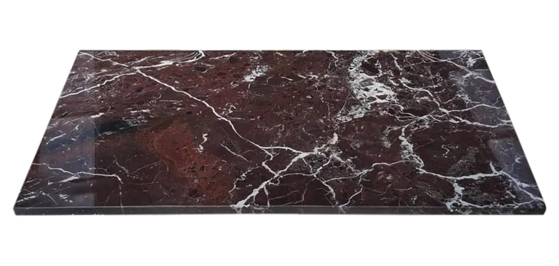 Marble countertop with dark brown and white veins on a white background