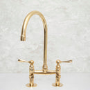 Elegant Unlacquered Brass Kitchen Bridge Faucet with Stylish Lever Handles