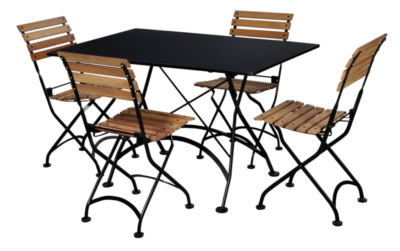 Black metal table with four wooden chairs on a white background