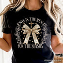 Jesus Is the Reason Christmas T‑Shirt, Coquette Gold Bow Cross Tee for Faithful Women