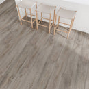 SPC Vinyl Rigid Core 7" Width 60" RL, 6mm Thick, 1.5mm IXPE Gilded Slate Amare Floors - Mazzia Collection Product shoot Hall view 