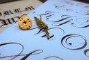 Quill Gold Lapel Pin