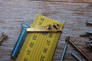 Saw Gold Lapel Pin