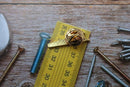 Saw Gold Lapel Pin