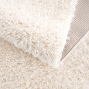 Faina Solid Cream Shag Washable Area Rug - Clearance