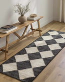 Andrin Black Area Rug