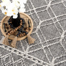 Diah Black & Bone Outdoor Area Rug - Clearance
