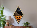 Creepy crow on heart-eyed jack-o-lantern Diamond Shaped Art Canvas Embossed Print with spooky season charm and gothic whimsy