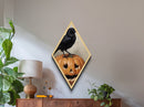Gothic crow on jack-o-lantern with fall leaves Canvas Art Print in haunting Halloween Diamond Shaped Art composition