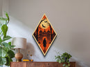 Haunted forest gate with bats and hunter Canvas Art Print in Diamond Shaped Art format with gothic Halloween orange atmosphere