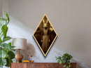 Vintage rabbit-headed woman surrounded by eerie companions immortalized in Diamond Shaped Art as a gothic Halloween Canvas Embossed Print