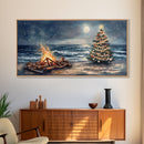 Cozy Bonfire On Beach With Christmas Tree Framed Canvas Print, Nighttime Winter Beach Holiday Wall Art And Coastal Decor