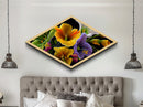 Midnight Bloom Glow Diamond Shaped Canvas Embossed Print with bold floral close-up, colorful petals on black, dramatic flower wall art