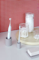 The Toothbrush Holder