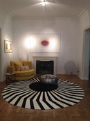 JAPAN SUN – Round Cowhide Rug in Black and White for Trade Professionals