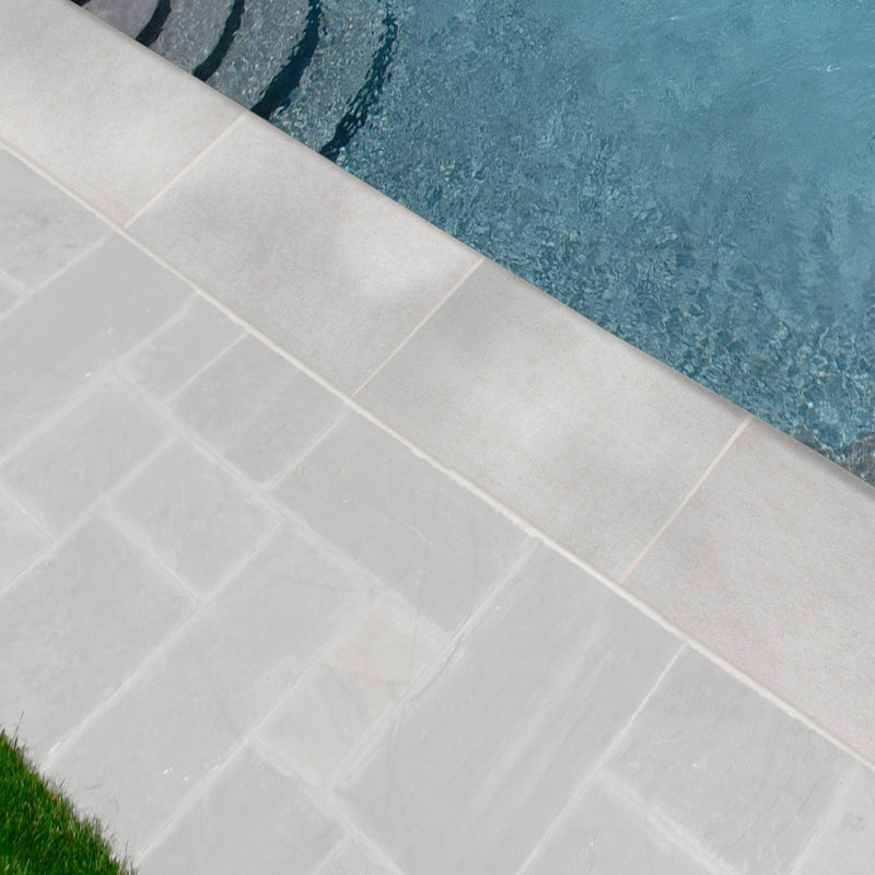 Arterra Beton Blanco 13"x24" Porcelain Pool Coping - MSI Collection room shot outdoor pool view