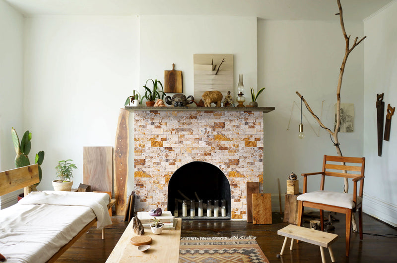 Leonardo Onyx Ledger 3D Panel 6"x24" Natural Marble Wall Tile - Full Truckload installed around fireplace wooden objects on top of the fireplace wide view
