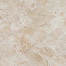 Light Antique Travertine Pattern Tumbled Pavers - Full Truckload wet look angle view