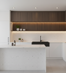 Modern kitchen with wooden cabinets, black sink, and white tiled walls.